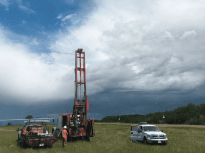 Rig-&-crew-with-stormy-sky